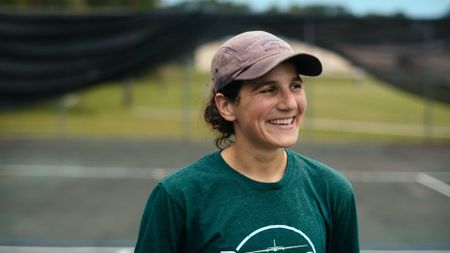 Student Captain Steph Harris enjoys some downtime with a game of pickleball. (Credit: National Geographic)