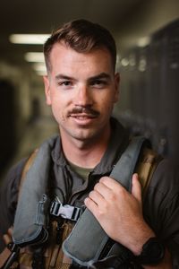 Student 1st Lt Chuck Kent poses in the hallway on base. (Credit: National Geographic/Freddie Claire)