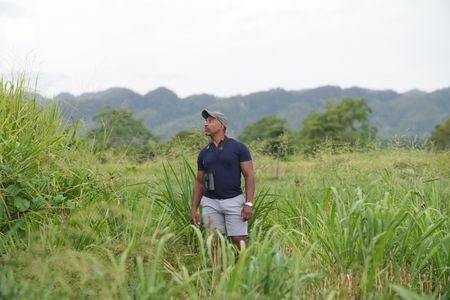 Christian Cooper takes a moment to reflect on the natural beauty at Hacienda la Esperanza. (National Geographic for Disney)