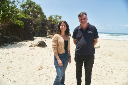 360 team member Melissa Cristina Márquez and shark expert Daryl McPhee on the beach at Ballina. (National Geographic/Justine Kerrigan)