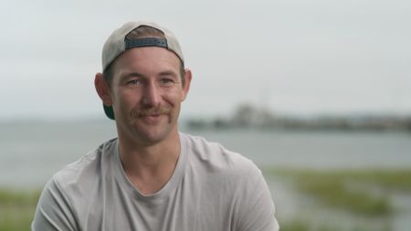 Garison Covel, contributor, being interviewed as he recalls witnessing Phil Garn being bitten by a shark whilst he was on lifeguard duty at Coronado Beach, California. (National Geographic)