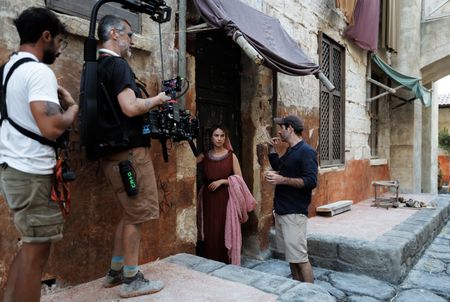 Director of Photography Jim Jolliffe, Madeleine Walker as Claudia, and Director, Showrunner and Executive Producer Tom Barbor-Might, behind-the-scenes of Pompeii: Out of Time with Tom Hiddleston. (National Geographic/Darrin Zammit Lupi)