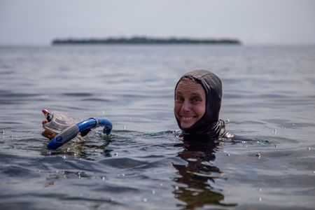 Octopus researcher, Dr. Crissy Huffard, on a scouting snorkel for Algae octopus (Abdopus aculeatus) in Bunaken Marine Park.  (photo credit: National Geographic/Annabel Robinson)