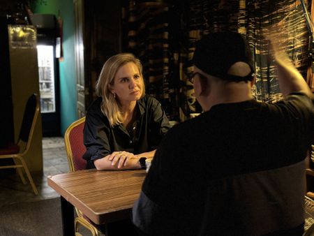 V explains to Mariana van Zeller how his team of investigators are breaking the case of women being trafficked into China as brides. (National Geographic)
