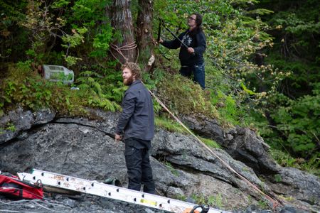 Oliver Johnson and Breanna Miethe construct a hoist on their property. (National Geographic/Lukas Taylor)