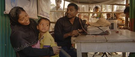 Kamal Hussein reunites a child with his mother. Lost and Found, directed by Academy Award winner Orlando von Einsiedel (“The White Helmets”, “Virunga"), is an inspiring story of humanity and heroism in the world’s largest refugee camp, that follows Kamal Hussein, a Rohingya refugee who has dedicated his life to reuniting children with their parents. (Nobel Media)