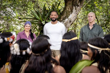 (From left to right): Expedition Leader Carla Perez, Will Smith and Professor of Toxicology Bryan Fry  meet the Waorani people in the Ecuadorian rainforest. (credit: National Geographic/Kyle Christy)