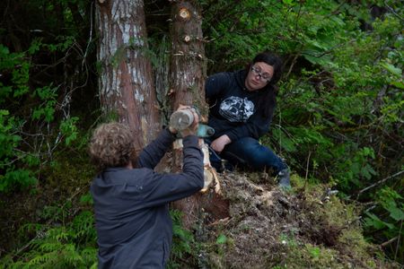 Oliver Johnson and Breanna Miethe construct a hoist on their property. (National Geographic/Lukas Taylor)