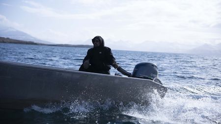 Marvin Agnot in his skiff on the open water. (National Geographic/Ashton Hurlburt)