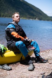 Professional kayaker Ben Stookesberry puts on his shows by the lake, sitting on his kayak.  (National Geographic/Harrison Gayton)