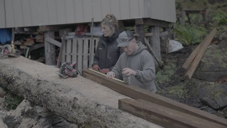 Sarah McDonald and Troy Brockway construct a ramp on their home property. (National Geographic/Gil Cano)