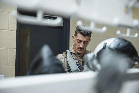Student 1st LT Austin Claggett gets ready in the Paraloft at El Centro Naval Air Base. (National Geographic/Freddie Claire)