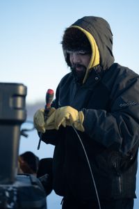 Tig Strassburg sets wolverine and wolf traps in the winter season. (National Geographic/Pat Henderson)