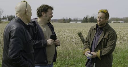 Dr. Jan Pol, Charles Pol, and Ben Reinhold have a conversation.  (National Geographic)