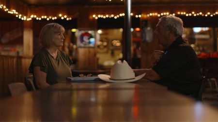 Debra Elliott, an ex-employee of the Top Rail Bar, meets Detective David Turner of Smith County Sheriff's Office as part of his investigation. (National Geographic/Will Francome)