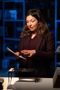 Historian Yasmin Khan looks at archival documents to dissect the events that led to the sinking of the Titanic in 1912. (National Geographic/Gary Moyes)