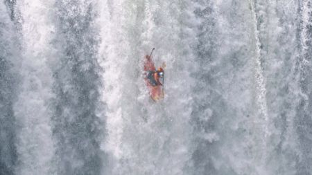 Gerd Serrasolses kayaks down a waterfall.  (mandatory photo credit: Red Bull Media House)