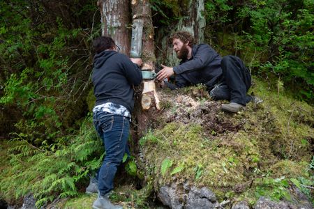 Breanna Miethe and Oliver Johnson construct a hoist on their property. (National Geographic/Lukas Taylor)