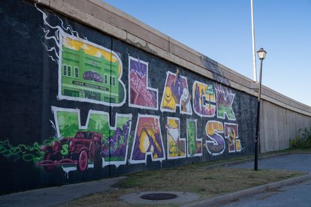 The Black Wall St. mural in the Greenwood district of Tulsa, OK. (National Geographic/Christopher Creese)