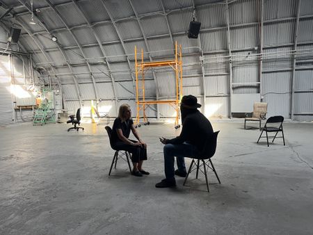 Mariana van Zeller interviews El Gringo in a hangar space in Los Angeles, California. (National Geographic)