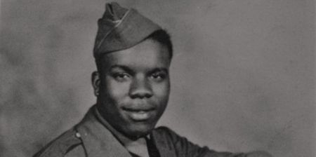 Private Henry Parham is seen in close-up portrait wearing his military uniform. Private Parham served with the 320th Barrage Balloon Battalion on D-Day. (Linda Hervieux)