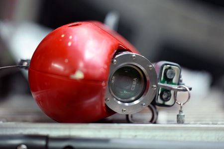 A camera tag rests in the sub hangar. (National Geographic/Mario Tadinac)