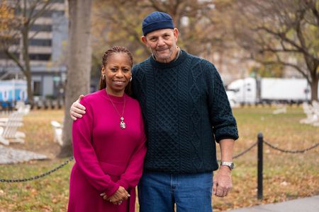 Lt. Col. Marilyn Wills and Cmdr. Craig Powell, who both worked at the Pentagon during the 9/11 attacks. Powell saved Wills by catching her and others from a window as they jumped out of the Pentagon. (National Geographic/Virginia Sherwood)
