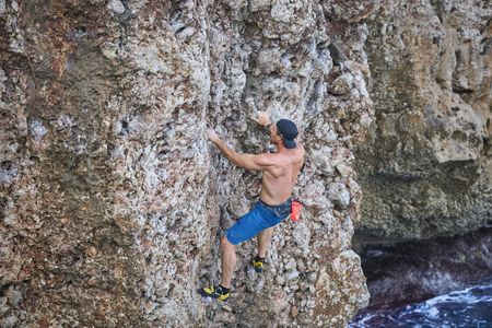 Chris recruits the help of Steph Davis, one of the best free solo climbers in the world, to train for a ëDeep Water Soloingì ñ no ropes, no safety equipment, just Chris climbing the rock face from the sea to the top of the cliff. This training will help prepare him for his final 600-foot climb on a wintery Swiss Alps Dam. (credit: National Geographic/Evan Paterakis)