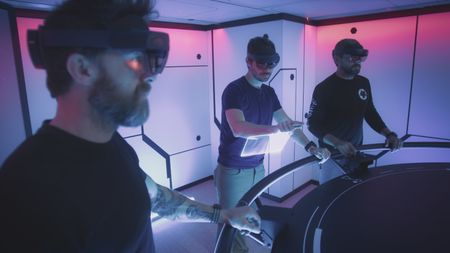 Aldo Kane, Eric Stackpole and Matt Smukall are in the OceanXplorer's Hololab to explore the anatomy of the great hammerhead shark. (National Geographic)