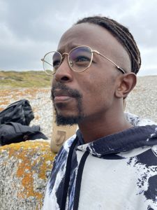 Gibbs Nuguru looking out to the beach. (National Geographic/Robert Cowling)