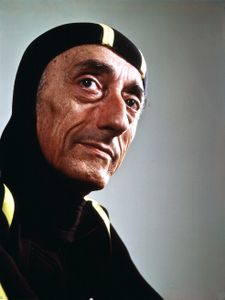 BECOMING COUSTEAU - Jacques Cousteau in a diving suit, 1972. (Credit: Yousuf Karsh)