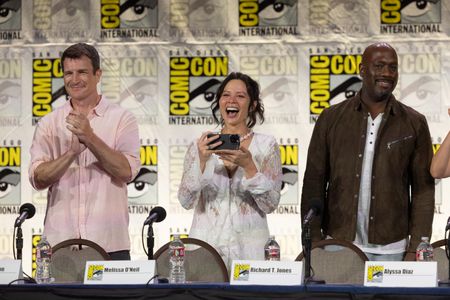 NATHAN FILLION, MELISSA O’NEIL, RICHARD T. JONES