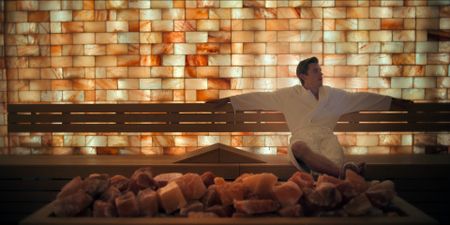 Antoni Porowski relaxes in the Himalayan salt room at QC Spa on Governor's Island. (National Geographic)