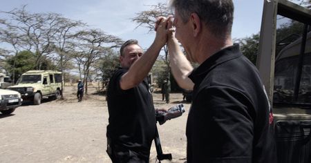 Thomas Hildebrant and Frank Goeritz from BioRescue celebrating a pregnancy check.  (credit: National Geographic)