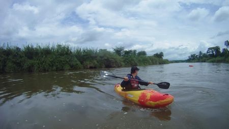 Paddling to escape a crocodile attack, Chris Korbulic turns to see Hendri Coetzee's overturned kayak.  (mandatory photo credit: Benjamin Stookesberry)