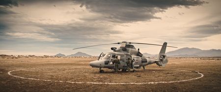 Mexican navy soldiers board helicopter in San Felipe. (photo credit: National Geographic)