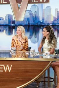 BUSY PHILIPPS, SUNNY HOSTIN