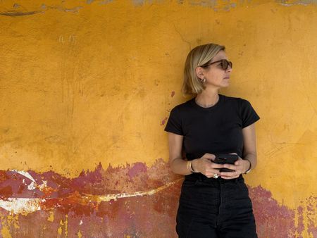 Mariana van Zeller stands for a portrait in Accra, Ghana. (National Geographic/Daniel Hollis Diamond)