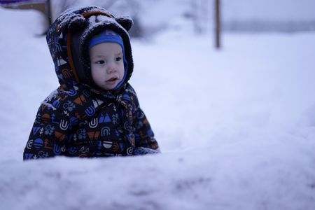 Wesley Strassburg playing in the snow. (National Geographic/Wayne Shockey)