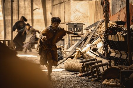 Avianius, played by Frankie Treadaway, sprints through the streets of Pompeii, desperately running to escape the pyroclastic flow. (National Geographic/Darrin Zammit Lupi)
