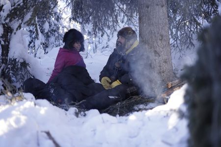 Tig and Hazel Strassburg stay warm during the winter season while checking their trapline. (National Geographic/Wayne Shockey)