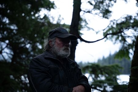 Terry Simpson is grateful for his neighbors' help in building him a new cabin. (National Geographic/Robert Jolley)