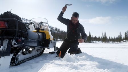 Joel Jacko ice fishing. (National Geographic)