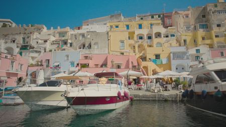 TUCCI IN ITALY - “Naples & Campania” - Arriving at the colorful port of Marina di Coricella in Procida. (National Geographic)TUCCI IN ITALY