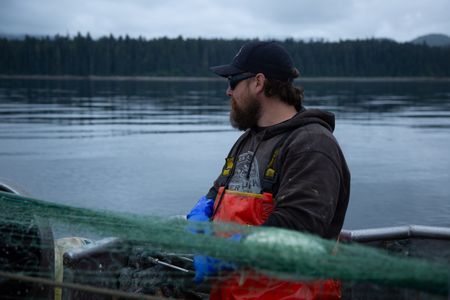 Carl Hernandez fishes for salmon. (National Geographic/Lukas Taylor)