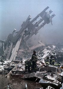 Firefighters navigate the rubble of the World Trade Center on September 11, 2001. (Richard Levine/Alamy Stock Photo)