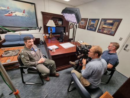 Commander Austin Ordway in his office during an interview with DOP Jon Southgate-Sayers and Director Chris Parkin. (Credit: National Geographic/Evan Parker)
