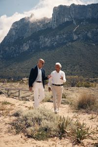 TUCCI IN ITALY - “Sardinia” - Stanley Tucci and 92-year-old Tonino Bertoleoni, the King of Tavolara.  His family have laid claim to this tiny island since his great-great-grandfather took the reins in 1836. (National Geographic/Matt Holyoak)STANLEY TUCCI, TONINO BERTOLEONI