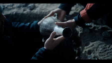 A recreation shows archaeologists discovering Inca artifact. (2023 BOG PEOPLE SEASON ONE INC.)