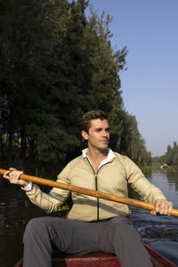 Antoni Porowski paddles through the canals of Xochimilco in National Geographic's Best of the World with Antoni Porowski. (National Geographic/Alicia Vera)